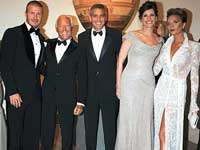 George Clooney with the Beckhams and Giorgio Armani