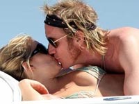 Sienna Miler and Rhys Ifans kissing