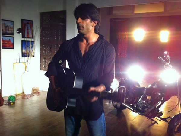 Karan Plays Guitar