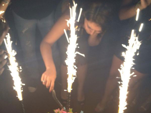 Hansika Cutting Cake With Power Team