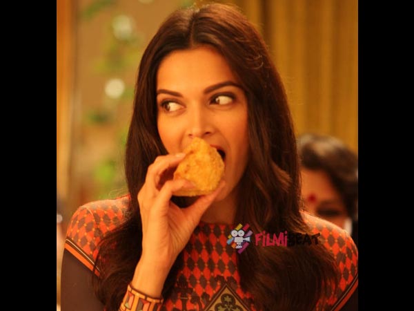 Deepika Eating Samosa