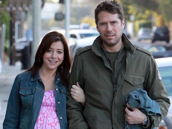Alexis Denisof and Alyson Hannigan