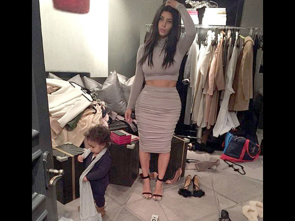 Kim Kardashian Goes Braless, Shows Off Abs