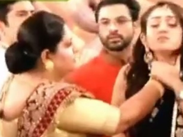 Gaura Holds Meera's Neck