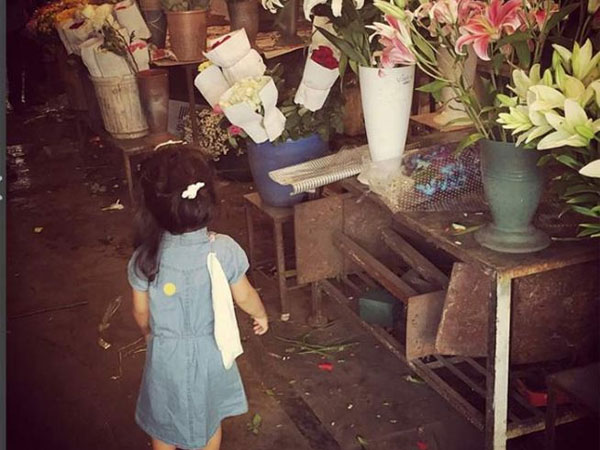 Nitara Looking At Flowers Nitara Looking At Flowers