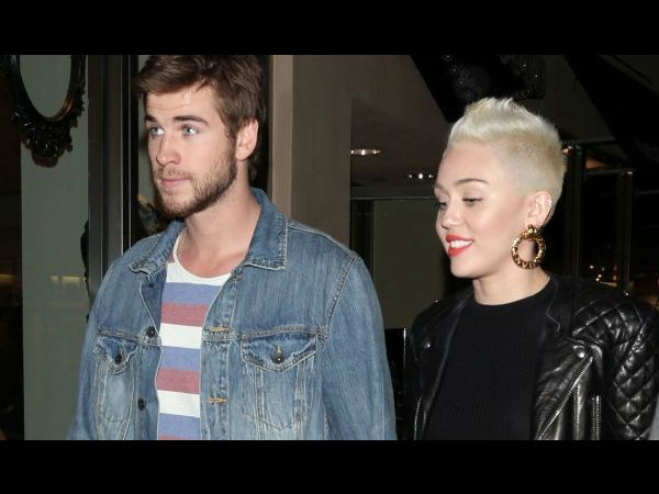 Miley Cyrus and Liam Hemsworth have moved in together. Miley Cyrus seen with an engagement ring her Miley Cyrus and Liam Hemsworth have moved in together. Miley Cyrus seen with an engagement ring her