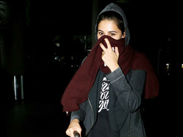 Nargis Fakhri Hides Her Face At The Mumbai Airport Nargis Fakhri Hides Her Face At The Mumbai Airport