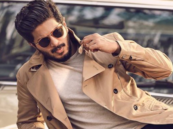 Dulquer Salmaan As Omi Prakash/Om Kapoor (Shahrukh Khan) Dulquer Salmaan As Omi Prakash/Om Kapoor (Shahrukh Khan)