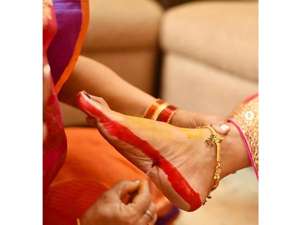 Her Feet Are Painted With Alta