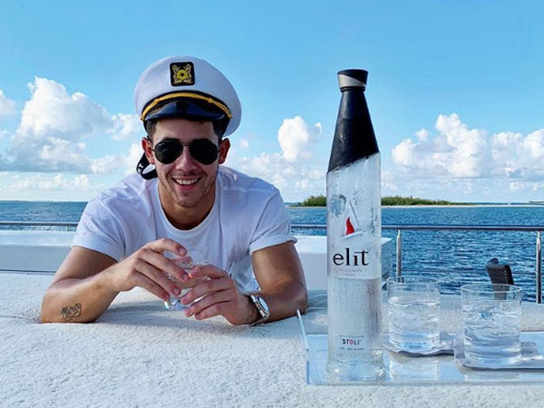 The Secret Behind Nick Jonas' Bachelor Party Photo With Elit Vodka
