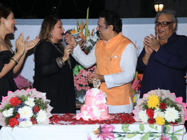Govinda Feeds Cake To His Wife In A Tender Moment Govinda Feeds Cake To His Wife In A Tender Moment