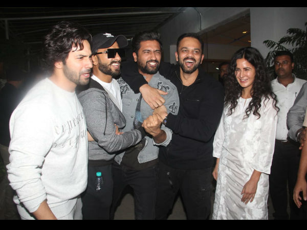 The Group Huddles Around URI Star Vicky