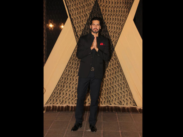 Dino Morea Poses For The Shutterbugs At The Reception