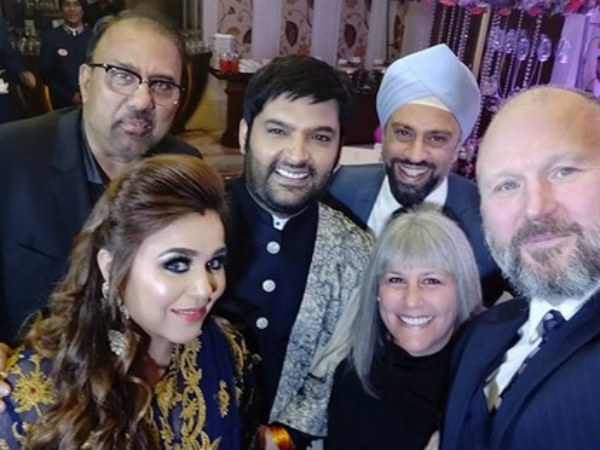 Kapil Posing With Guests Kapil Posing With Guests