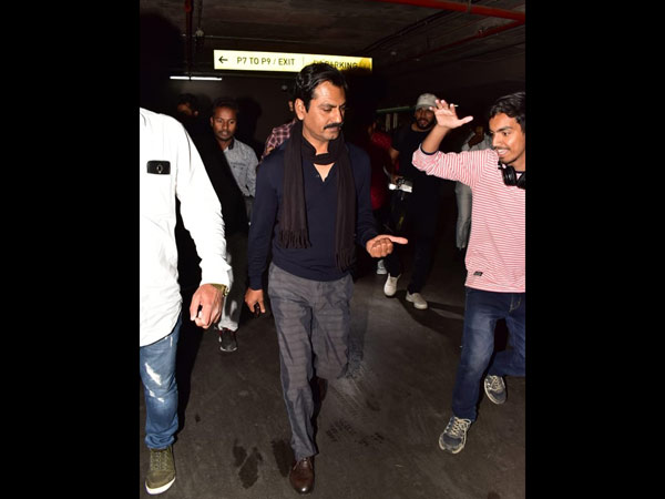 Nawaz Gives Hi Five To A Fan At The Airport