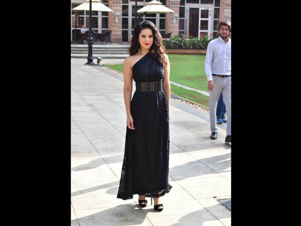 Sunny In A Stunning Black Gown At An Event