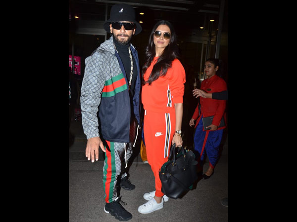 Ranveer & Deepika Walk Hand In Hand At Airport Ranveer & Deepika Walk Hand In Hand At Airport