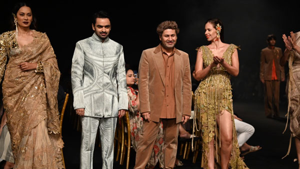 Kalki poses with designer