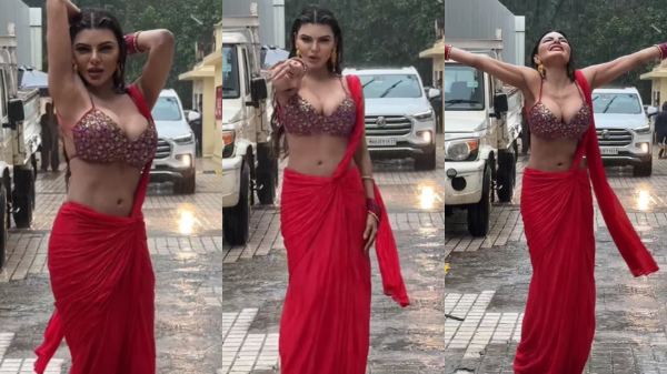 Sherlyn Chopra Trolled For Her Rain Dance In Red Saree
