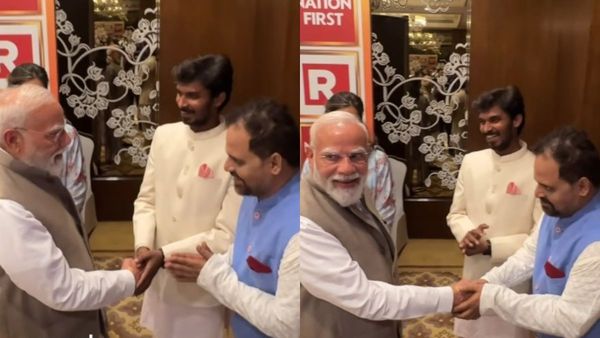 PM Modi greeting Panchayat actors Binod and Bhushan PM Modi greeting Panchayat actors Binod and Bhushan