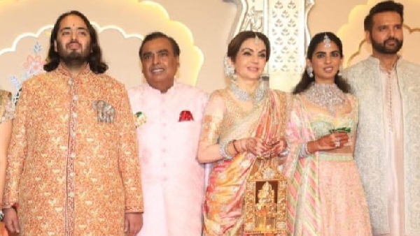 ईशा अंबानी और आनंद पिरामल का आउटफिट