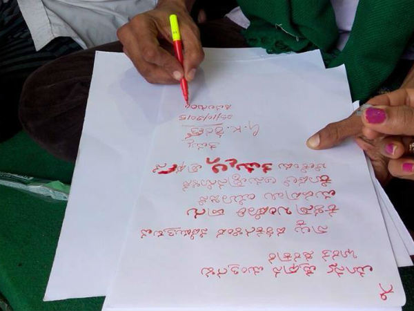 Kannada Actor Sharan Writing letter in Blood