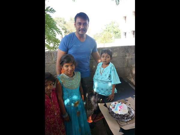 kannada actor darshan celebrated a small girls birthday kannada actor darshan celebrated a small girls birthday