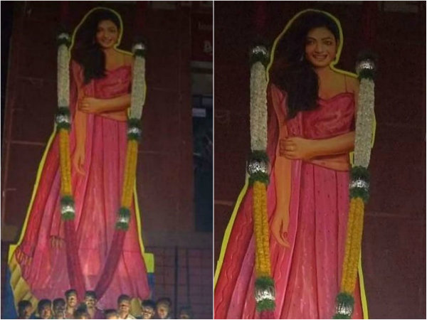 Rashmika mandanna cutout in front of yajamana theater Rashmika mandanna cutout in front of yajamana theater