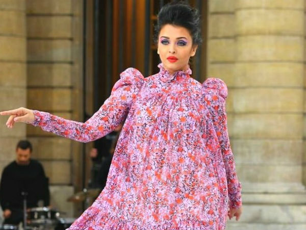 Bollywood Actress Aishwarya Rai Ramp Walk In Purple Dress With Purple Eye Makeup