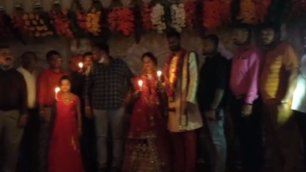 Newly married couple paid tribute to Puneeth Rajkumar at the wedding hall Newly married couple paid tribute to Puneeth Rajkumar at the wedding hall