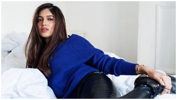 Actress Bhumi Pednekar Trolled after netizens spot her assistant removing her shoes at an event 
