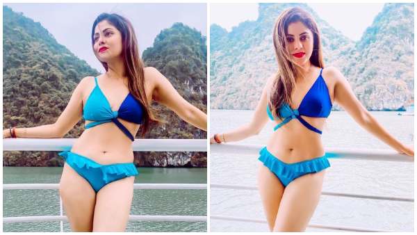 Geetha Serial fame Actress Sharmitha Gowda poses with a snake during Vietnam trip 