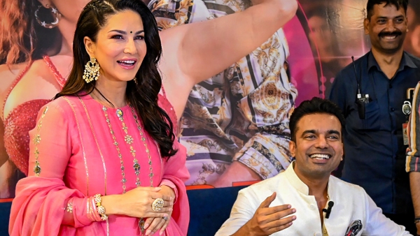 Actress Sunny Leone attends Ganga Aarti with Abhishek Singh in Varanasi Actress Sunny Leone attends Ganga Aarti with Abhishek Singh in Varanasi