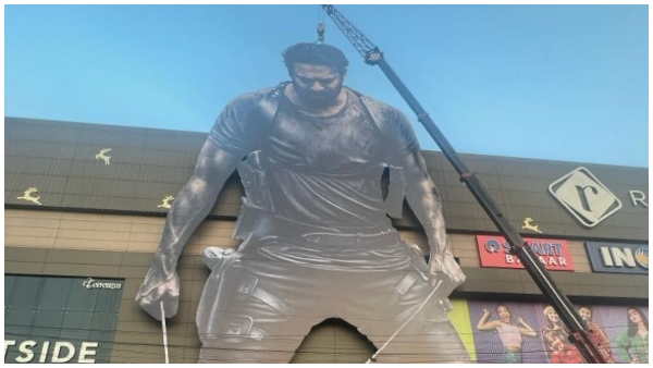 Rajamouli buys the first ticket of Salaar, 120 feet Prabhas cutout in Mumbai Rajamouli buys the first ticket of Salaar, 120 feet Prabhas cutout in Mumbai