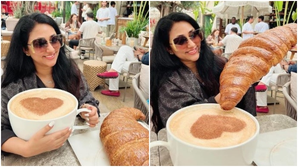 darshans-wife-vijayalakshmi-relishes-a-generous-cup-of-coffee-with-croissant