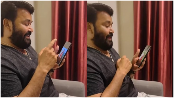 A video of Mohanlal humming while watching a Dr Rajkumar s super hit song has gone viral