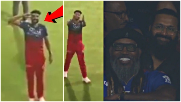 rishab-shetty-receives-a-salute-and-flying-kiss-from-mohammad-siraj