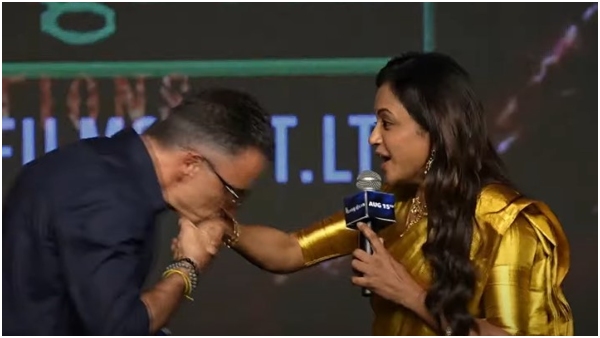 Actor Daniel Caltagirone kissed anchor suma hand on-stage