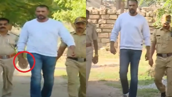 Challenging star Darshan Shows Bad Hand Gesture towards Media Cameras in Bellary Jail
