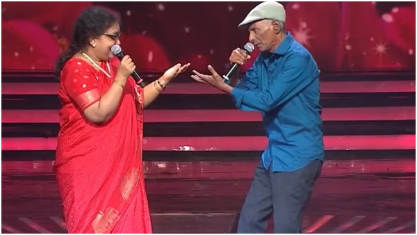 Sarigamapa senior contestant Raju gifts to judge Vijaya Prakash