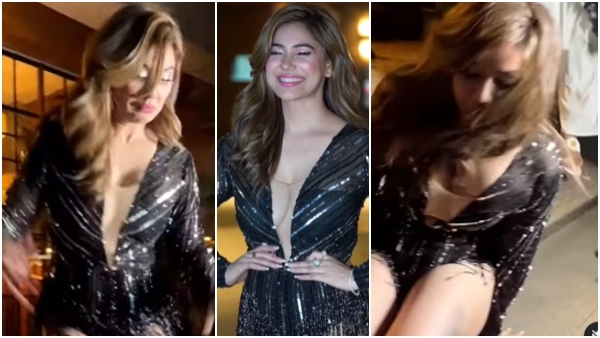 Bollywood Actress Kangana Sharma falls down the stairs while posing for the media