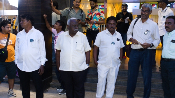 OneIndia Bridges Reel and Real Chennai Harbour Coolies Join Fans for Coolie Movie Celebration