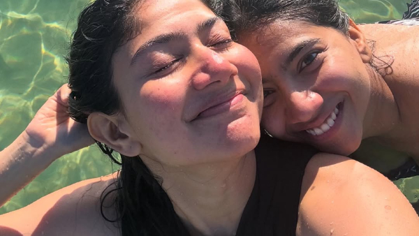 Enjoying a beach getaway Sai Pallavi posed with her sister Pooja Kannan sharing swimsuit photos online