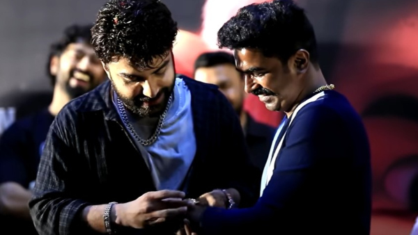 Ravi Basrur Gets Emotional as Vishwak Sen Gifts Rolex at Cult Teaser Launch Ravi Basrur Gets Emotional as Vishwak Sen Gifts Rolex at Cult Teaser Launch