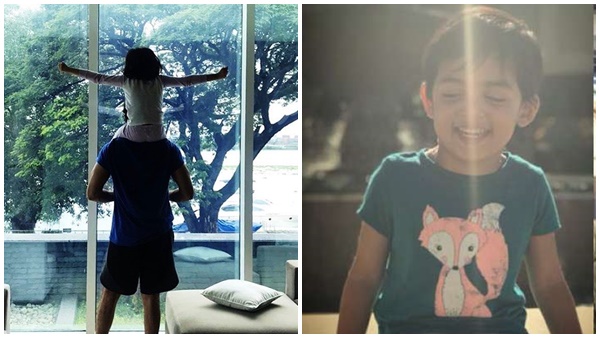  അച്ഛന്റെ തോളിൽ