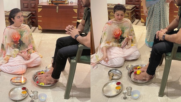 ഭർത്താവിന് പാദശുശ്രൂഷ ചെയ്യുന്ന ചിത്രം പങ്കുവെച്ച നടി പ്രണിത 