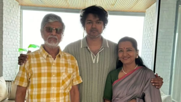 Vijay with his parents