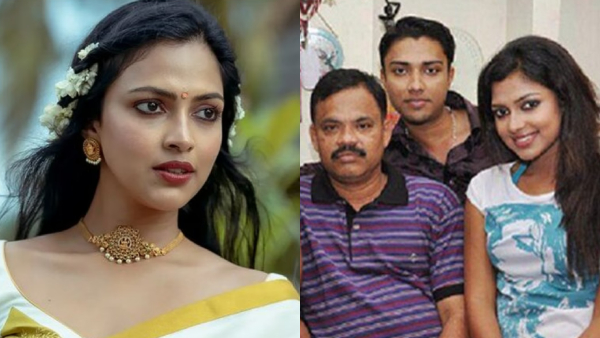Amala Paul with her father and brother Amala Paul with her father and brother