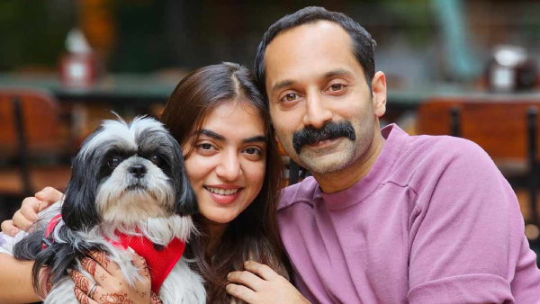 Fahadh and Nazriya with their fur baby Oreo