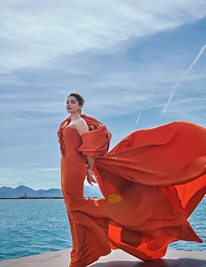 Cannes 2022: Deepika Padukone Casts A Spell In An Orange Gown